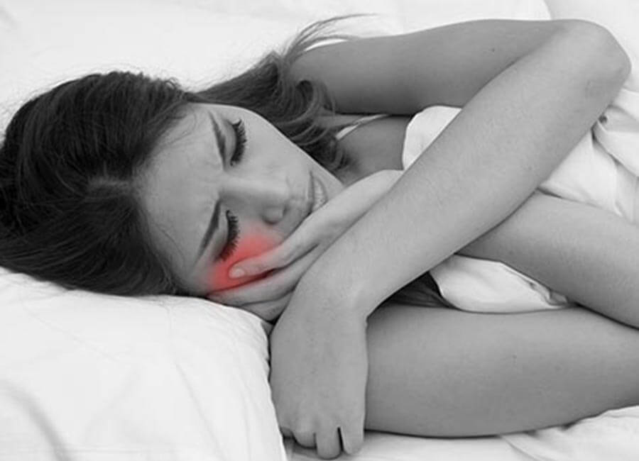 Female Suffering with Toothache