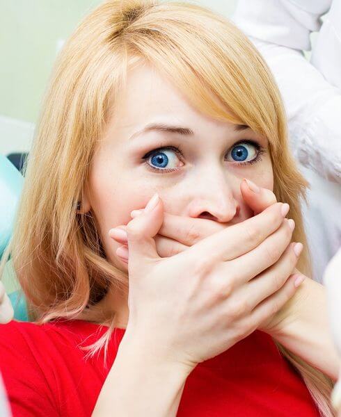 Woman Covering Mouth with hands