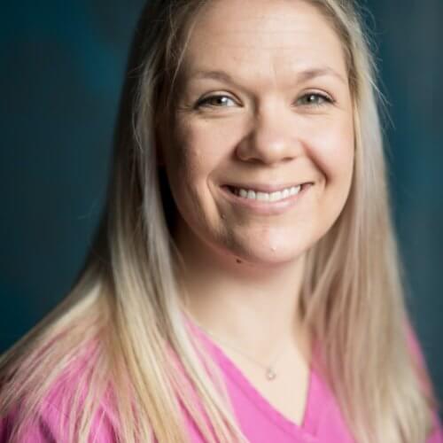 Smiling Dental Nurse with Blonde Hair