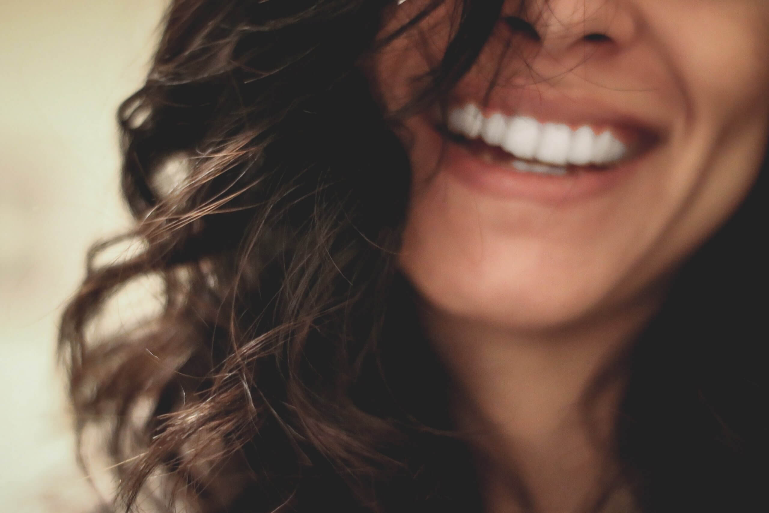 Women Smiling With Black Hair